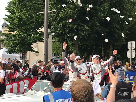 The Friday night drivers parade at Le Mans 2019: Porsche drivers throw out sweets to the fans