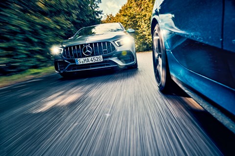 Merc A45 chases the BMW M135i in CAR magazine's twin test