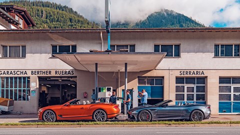 Feeding time: Aston Martin and Bentley refuel in the Alps