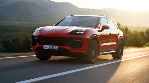 Porsche Cayenne GTS, front, red, driving at sunset