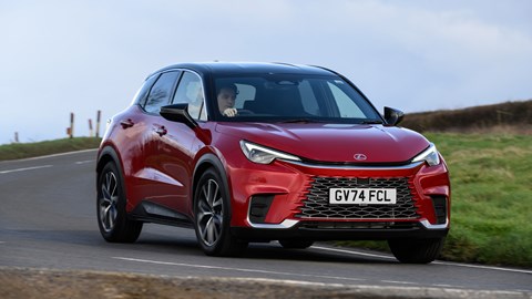 Best small hybrid cars: Lexus LBX - front, red, driving