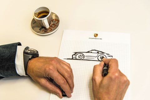 Sketching the purest kind of Porsche: design chief Michael Mauer draws the classic 911 silhouette on notepaper