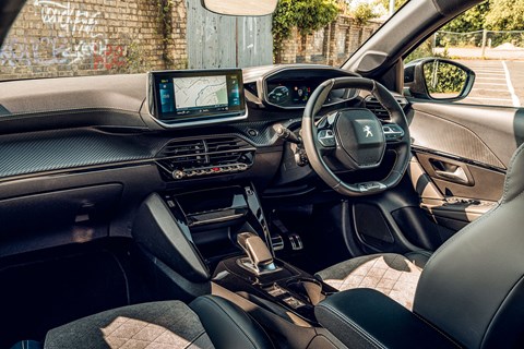 Peugeot e-208 interior: titchy-tiny steering wheel follows the brand's i-Cockpit layout, but it all works well