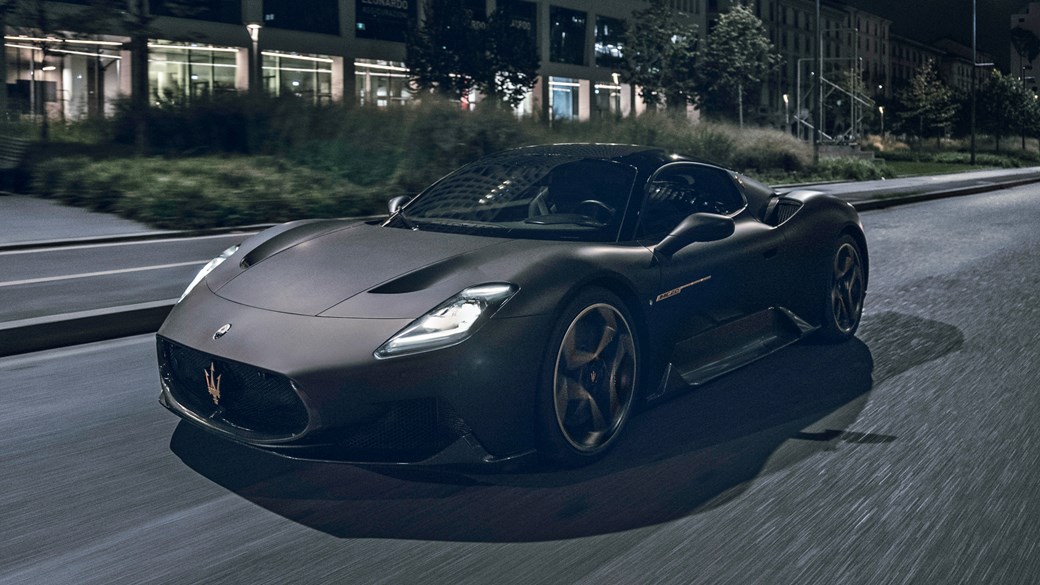 Maserati MC20 Notte: front three quarter driving, black paint