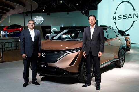 Ashwani Gupta (left) alongside the Nissan Ariya