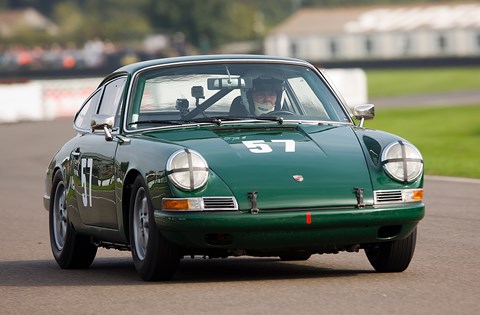 A 1965 Porsche 911 at the Fordwater Trophy at the 2014 Goodwood Revival Meeting (Getty)