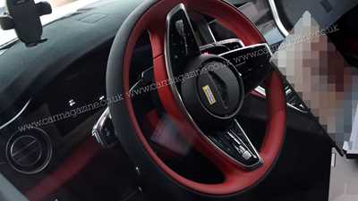 Bentley's first EV: new spy photographs show Cayenne-like interior