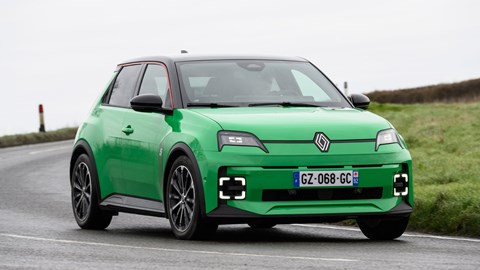 Best small electric cars: Renault 5 E-Tech, front, green, driving round corner, Bauer Media exclusive image