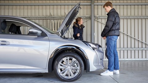 George Pollard learning how electric cars work