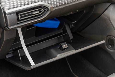 Undamped Dacia Sandero glovebox has simple nylon strap