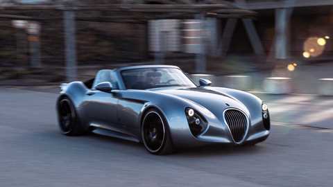 Wiesmann Project Thunderball: front three quarter rolling shot, silver car, lens flare