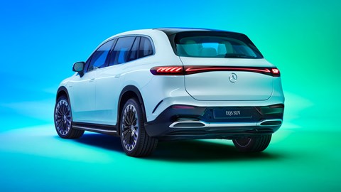 Mercedes-Benz EQS SUV, rear, white, trippy studio background of green and blue