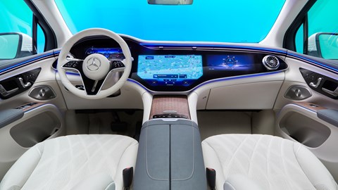 Mercedes-Benz EQS SUV, interior, dashbaord, hyperscreen, steering wheel, trippy studio background of green and blue