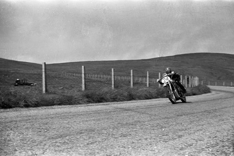 'Edward Kluge riding his DKW around aptly named Windy Corner in 1938'