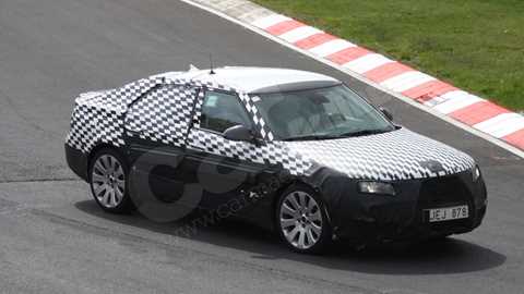 Saab 9-5 spy photos: seen here testing at the Nurburgring