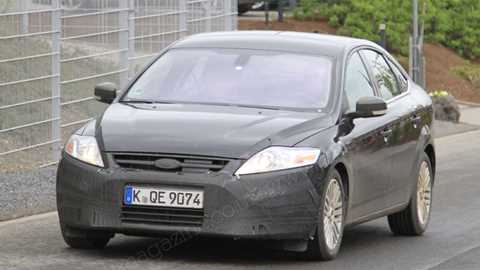 Scooped! The new Ford Mondeo (2010), a facelift for Ford's family car. You can see the new grille and gear to enable radar cruise control on the new fascia