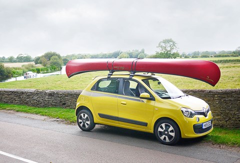 The Twingo is almost 1.5 metres shorter than its new red accessory