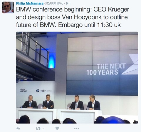 Top brass at BMW settle down for the press conference