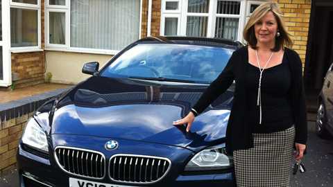 Tracey Lee with the first of six new BMW's she'll get to sample over the next 12 months